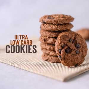 Stack of ultra low carb chocolate chip cookies on a linen cloth