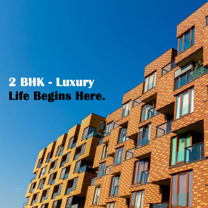 Modern brick apartment building against a clear blue sky