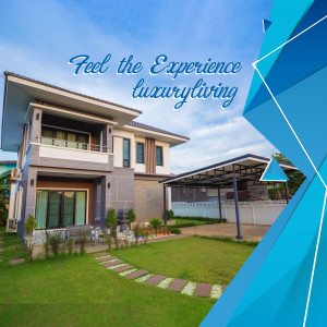 Modern luxury house with a well-maintained lawn and garden.