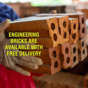 A hand holding a stack of red engineering bricks with text overlay advertising free delivery.