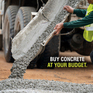Concrete being poured from a mixer truck with text 'Buy Concrete At Your Budget'