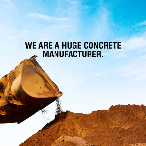 Excavator dumping concrete into a pile