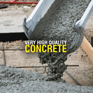 Concrete being poured from a chute onto a rebar framework.