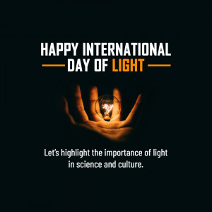 Hands holding a glowing lightbulb with text 'Happy International Day of Light'