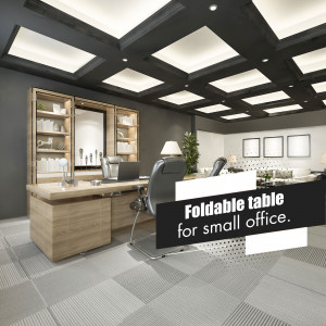 Interior view of a contemporary office with a wooden desk and a foldable table.
