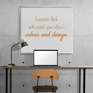 A minimalist home office setup with a laptop, desk lamp, and chair.