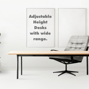 A minimalist home office featuring an adjustable height desk and a comfortable office chair.