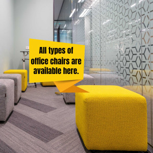 Modern office space with various seating options and a sign advertising office chairs.