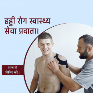 A physiotherapist examining a patient's shoulder.