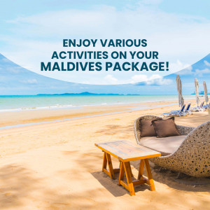 Relaxing beach scene in the Maldives with lounge furniture and turquoise water.