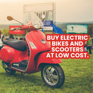 Red electric scooter parked on grass with advertisement for electric bikes and scooters