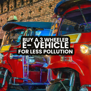 Red and yellow electric three-wheeler with advertisement for less pollution