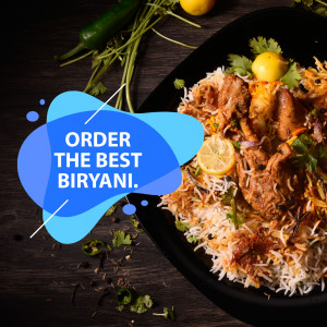 Close-up of a flavorful Biryani dish with lemon wedges and green chilies, promoting an order.