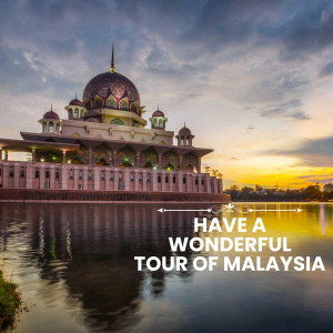 Beautiful view of the Putra Mosque in Malaysia at sunset with text overlay 'Have a Wonderful Tour of Malaysia'