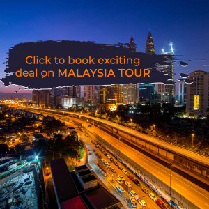Night view of Kuala Lumpur skyline with promotional text