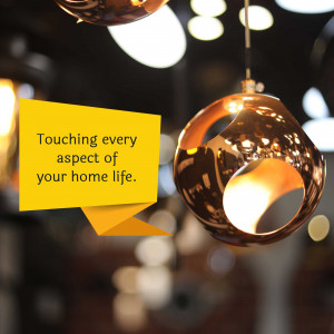 Close-up of a copper-colored sphere with a yellow speech bubble containing text.