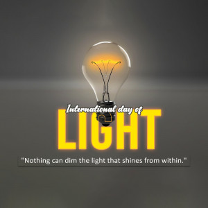 Glowing light bulb with text 'International Day of Light'