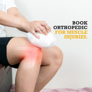 Woman holding an ice pack on her injured knee