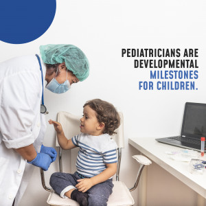 A pediatrician checks a young child's development during a checkup.