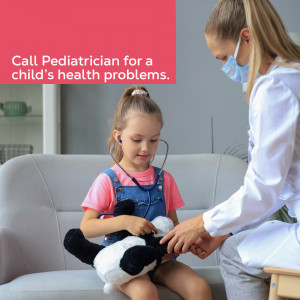 A female pediatrician with a face mask examining a young girl with a stethoscope.