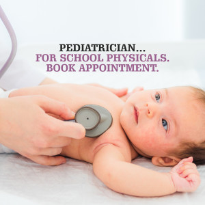 Doctor examining a baby with a stethoscope