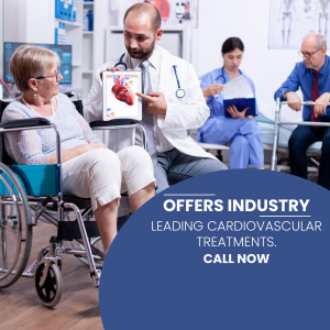 Doctor explaining a heart scan to senior patients in a clinic.