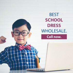 Cute boy with glasses and bow tie promoting school dress wholesale