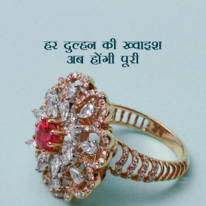Close-up of a gold ring with a large red gemstone and diamonds