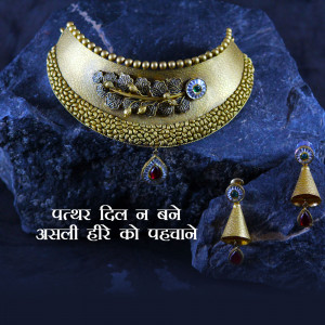 Close-up of a gold necklace and earrings set with intricate detailing and gemstones.