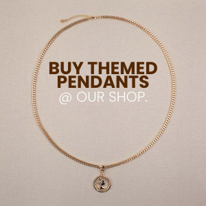 Gold chain necklace with a small pendant, advertising themed pendants.