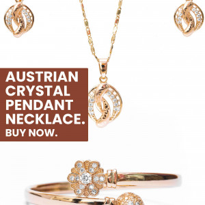 Close-up of Austrian crystal pendant necklace, earrings, and bracelet.
