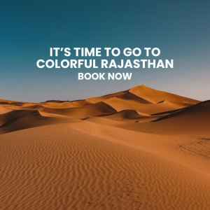 Desert landscape with text promoting travel to Rajasthan