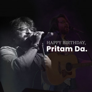 Pritam Chakraborty, a popular Indian music composer and singer, performing on stage with a guitar.