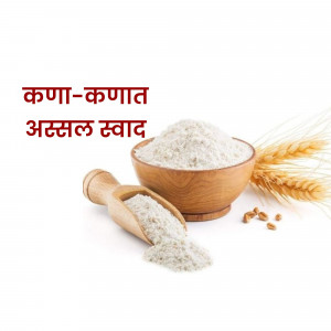 Bowl of flour with wheat stalks and a wooden scoop