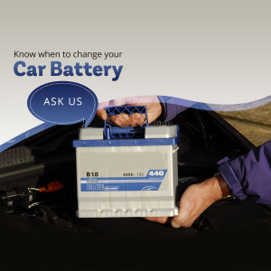 Mechanic holding a car battery with text 'Know when to change your Car Battery'