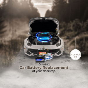 Car with open hood showing battery replacement service and tools