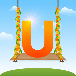 Orange letter U hanging from a decorated swing with marigold flowers.