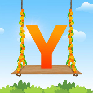 Orange letter Y decorated with marigold flowers hanging from ropes