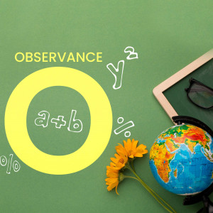 A flat lay image featuring school supplies and a globe on a green chalkboard.