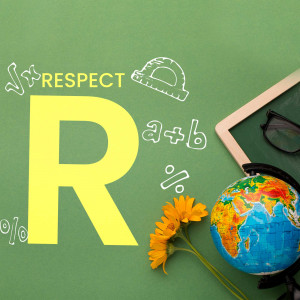 A chalkboard with the word 'RESPECT' written on it, surrounded by school supplies.