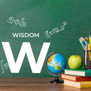 School supplies with equations and a globe on a green chalkboard