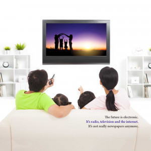 Family watching a movie on a large flat-screen TV in their living room.
