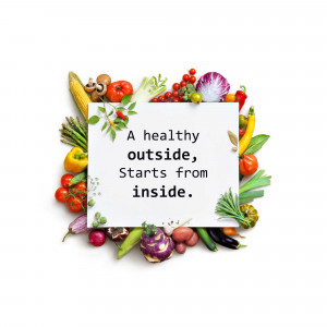 Fresh vegetables and fruits arranged around a white square with text.