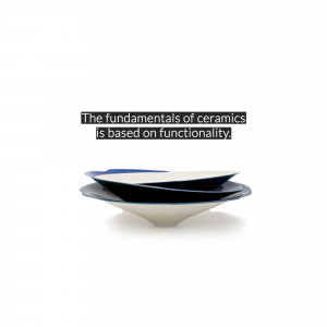 Stack of blue and white ceramic plates with text overlay