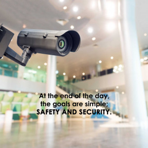 Close-up of a security camera monitoring a building lobby