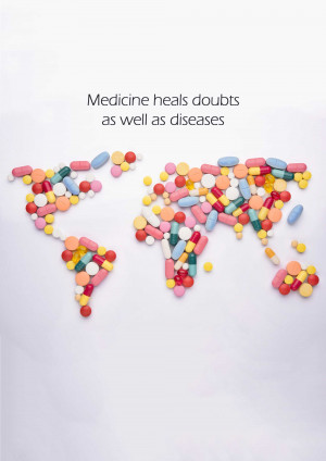 World map made of pills and capsules representing global health