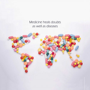 World map made of colorful pills and tablets