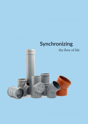 Assortment of grey and orange pipe fittings against a light blue background