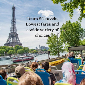 View of the Eiffel Tower with a tour bus in the foreground