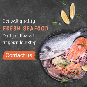 A platter of fresh seafood including fish, salmon, shrimp, and squid with lemon and herbs.